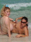 Its summer! Hot chick strips in the sea and enjoys her nude swimming with total joy!