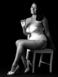 Artful black-and-white pics of big-tittied older seductress posing in lingerie