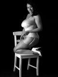 Artful black-and-white pics of big-tittied older seductress posing in lingerie