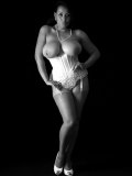 Artful black-and-white pics of big-tittied older seductress posing in lingerie