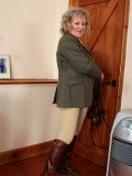 Sexy granny gets rid of all her clothes immediately after crossing the threshold