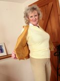 Sexy granny gets rid of all her clothes immediately after crossing the threshold