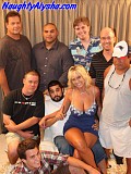 Blonde slut gangbanged by a bunch of horny well hung guys and drinks their cum from a champagne glass