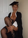 Hot pictures of a sexy mature blonde posing as a grad student and revealing her juicy tits