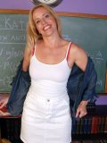 Mature teacher strips in classroom and measures her boobs! Want to know her size?