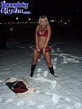 Crazy blonde bitch Alysha makes a dildo out of snow and fucks herself in the middle of a snowy field