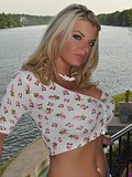 This gorgeous blonde bimbo wears a tight pair of daisy dukes to show off